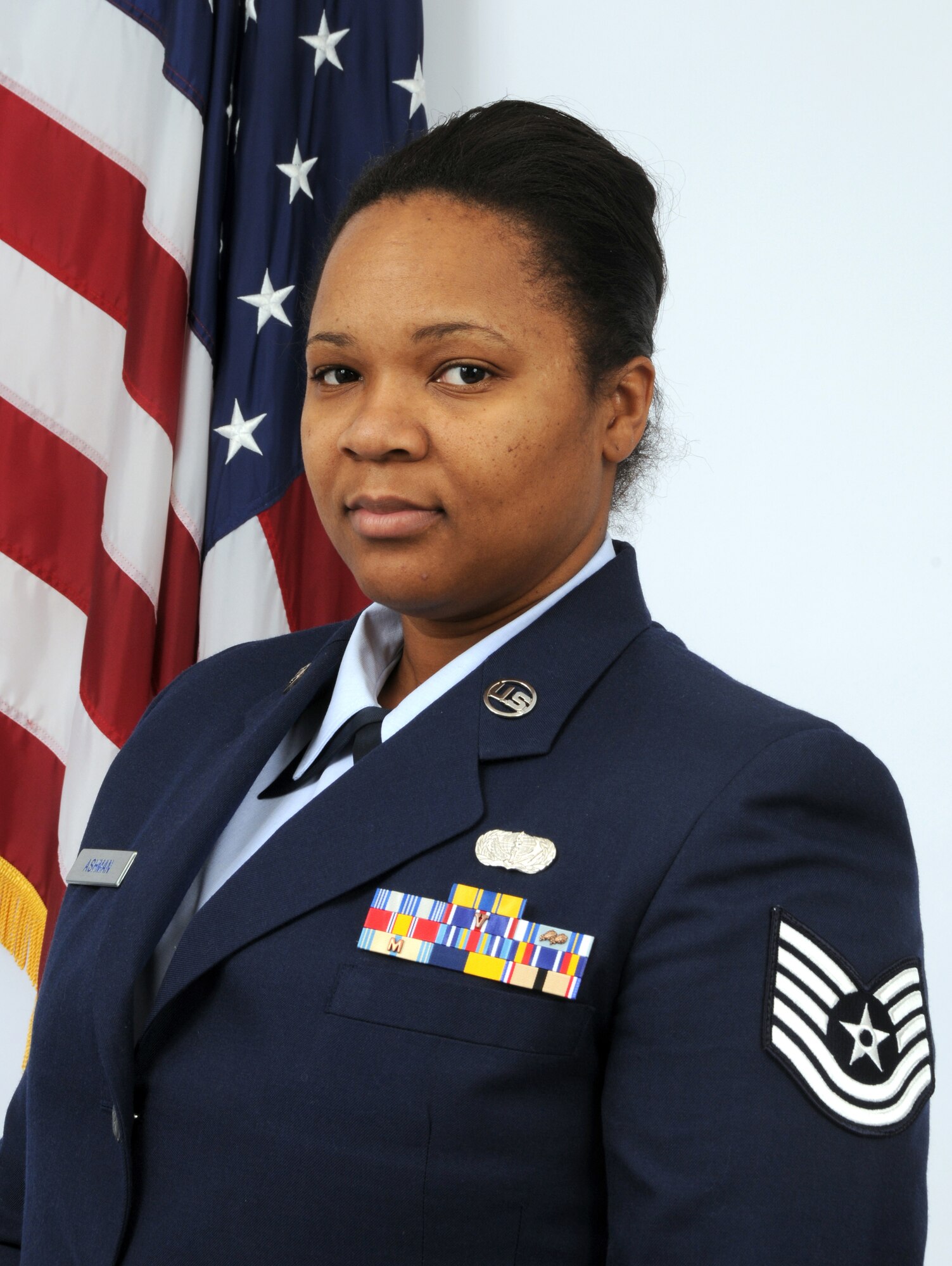 Technical Sgt. Tracy Ashman, a member of the 166th Force Support Squadron, 166th Airlift Wing, New Castle, Del., is the Delaware Air National Guard's FY 2009 Noncommissioned Officer of the Year. Sgt. Ashman, a resident of Bear, Del., is a services specialist in the 166th FSS, and deployed to Southwest Asia for six months in 2003 to Al Minhad Air Base, United Arab Emirates. She is a full-time nurse in the medical intensive care unit at Christiana Hospital, Del., holds an M.B.A. in health care, and is pursuing an additional masters degree in nursing and education. (U.S. Air Force photo/Senior Master Sgt. Gerald Dougherty, Delaware ANG)