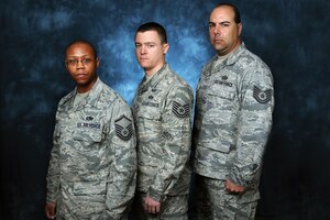 Master Sgt. Jason Broadus, left, Tech. Sgt. Brian Worley and Tech. Sgt. Humberto Camara, right, received promotions recently through the Stripes for Exceptional Performers program. The STEP program is a promotion recognition program used by commanders to recognize outstanding contributions and accomplishments. Sergeant Broadus, aerospace ground equipment craftsman with the 437th Maintenance Squadron, received his promotion Christmas Eve; Sergeant Worley, explosives ordnance disposal craftsman with the 628th Civil Engineer Squadron, was promoted Dec. 23; and Sergeant Camara, aviation resource manager with the 437th Operations Support Squadron, was promoted Jan. 6. The Airmen were officially promoted by Col. John Wood, 437th Airlift Wing commander, who was joined by Chief Master Sgt. Mike Ivey, 628th Air Base Wing command chief, and top leaders from each Airman's squadron and group. (U.S. Air Force photo/James M. Bowman)
