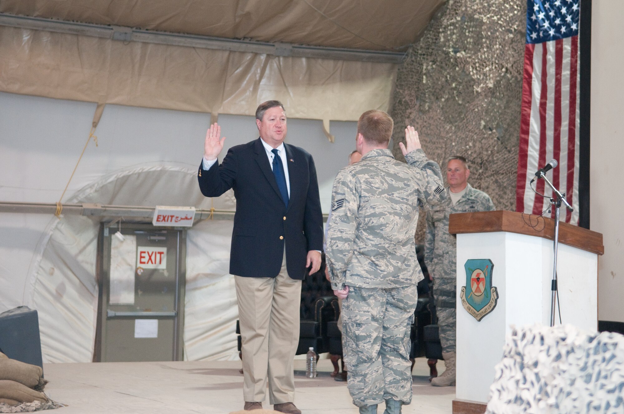 Secretary of The Air Force Michael Donley administers the oath of enlistment
to U.S. Air Force Staff Sgt. Eric Hinton, Air Transportation Specialist, 407
Expeditionary Logistics Readiness Squadron, during an Airmen's Call at Ali
Base, Iraq, Jan. 31, 2010. Staff Sgt. Hinton is deployed from the 730th Air
Mobility Squadron, Yakota AB, Japan. (U.S. Air Force photo /Senior Master
Sgt. Elizabeth Gilbert) Released