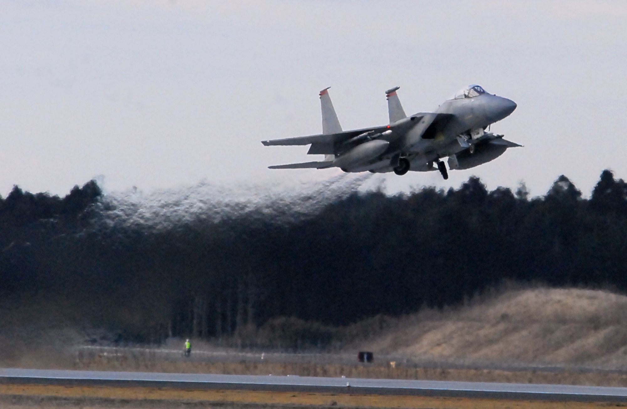 Capt. David Vincent, a pilot with the 67th Fighter Squadron, takes off Feb. 3 at Hyakuri Air Base. This was the third straight day of operations from the Japanese base as part of an aviation training relocation. (U.S. Air Force photo / 1st Lt. Bryan Bouchard)