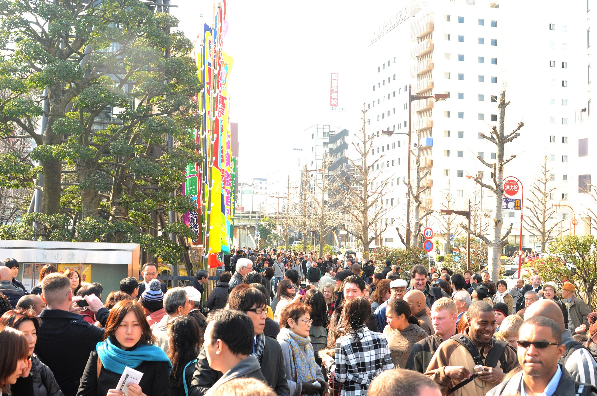 TOKYO -- A crowd gathers outside the Ryogoku Kokugikan "arena" for the retirement ceremony of sumo wrestler Ushiomaru Motouyasu Jan. 31. Amzumazwki-beya, a local Japanese sumo-training center, invited more than 600 students, parents and teachers from Yokota Air Base to experience this Japanese tradition. (U.S. Air Force photo/Airman 1st Class Katrina Menchaca)