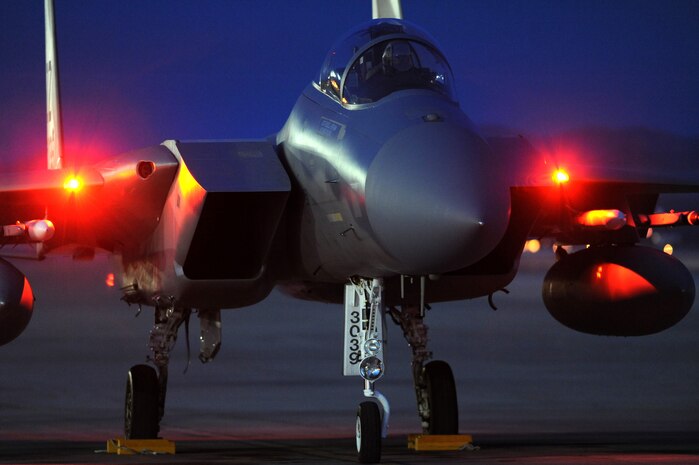 NELLIS AIR FORCE BASE, Nev. -- A 44th Fighter Squadron F-15 prepares to depart the Nellis flight line for a night training mission during Red Flag 10-2,  Feb. 2, 2010.  Red Flag is a realistic combat training exercise involving the air forces of the United States and its allies. The exercise is conducted on the 15,000-square-mile Nevada Test and Training Range, north of Las Vegas. (U.S. Air Force photo by Tech. Sgt. Michael R. Holzworth/RELEASED)