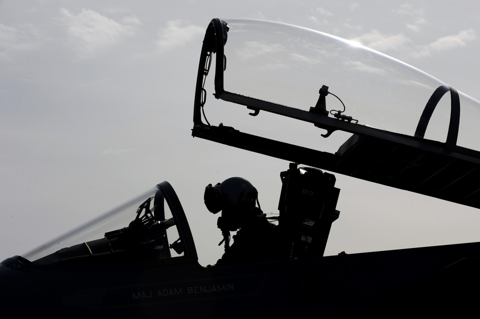 NELLIS AIR FORCE BASE, Nev. -- Maj. Nicholas Rutger, 44th Fighter Squadron goes over pre-flight checklist in the cockpit of an F-15 Eagle before departing on a training mission at Red Flag 10-2, Nellis Air Force Base, Nev., Feb. 2, 2010.  Red Flag is a realistic combat training exercise involving the air forces of the United States and its allies. The exercise is conducted on the 15,000-square-mile Nevada Test and Training Range, north of Las Vegas. (U.S. Air Force photo by Tech. Sgt. Michael R. Holzworth/RELEASED)
