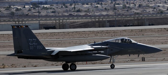 NELLIS AIR FORCE BASE, Nev. -- A F-15 deployed from the 18th Wing, Kadena Air Base, Japan taxis toward the end of the runway at Nellis Air Force Base, Nev., for a training mission during Red Flag 10-2, Feb. 2, 2010.  Red Flag is a realistic combat training exercise involving the air forces of the United States and its allies. The exercise is conducted on the 15,000-square-mile Nevada Test and Training Range, north of Las Vegas. (U.S. Air Force photo by Tech. Sgt. Michael R. Holzworth/RELEASED)