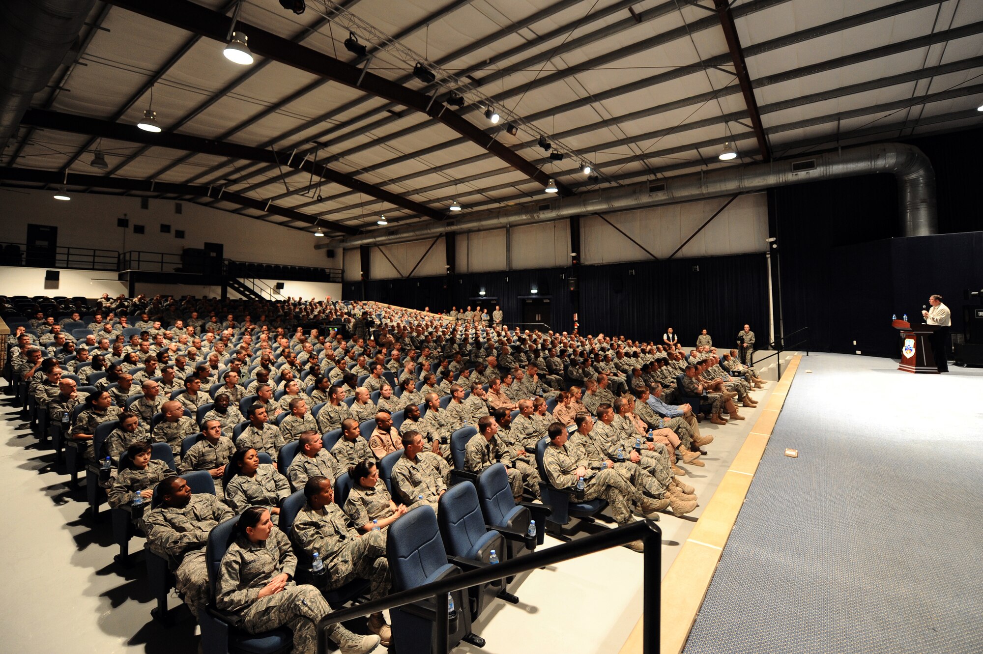 Secretary of the Air Force Michael Donley speaks to 379th Air Expeditionary Wing Airmen at the base theater during his visit Jan. 29, 2010, to a deployed location in Southwest Asia. (U.S. Air Force photo/Senior Airman Kasey Zickmund)