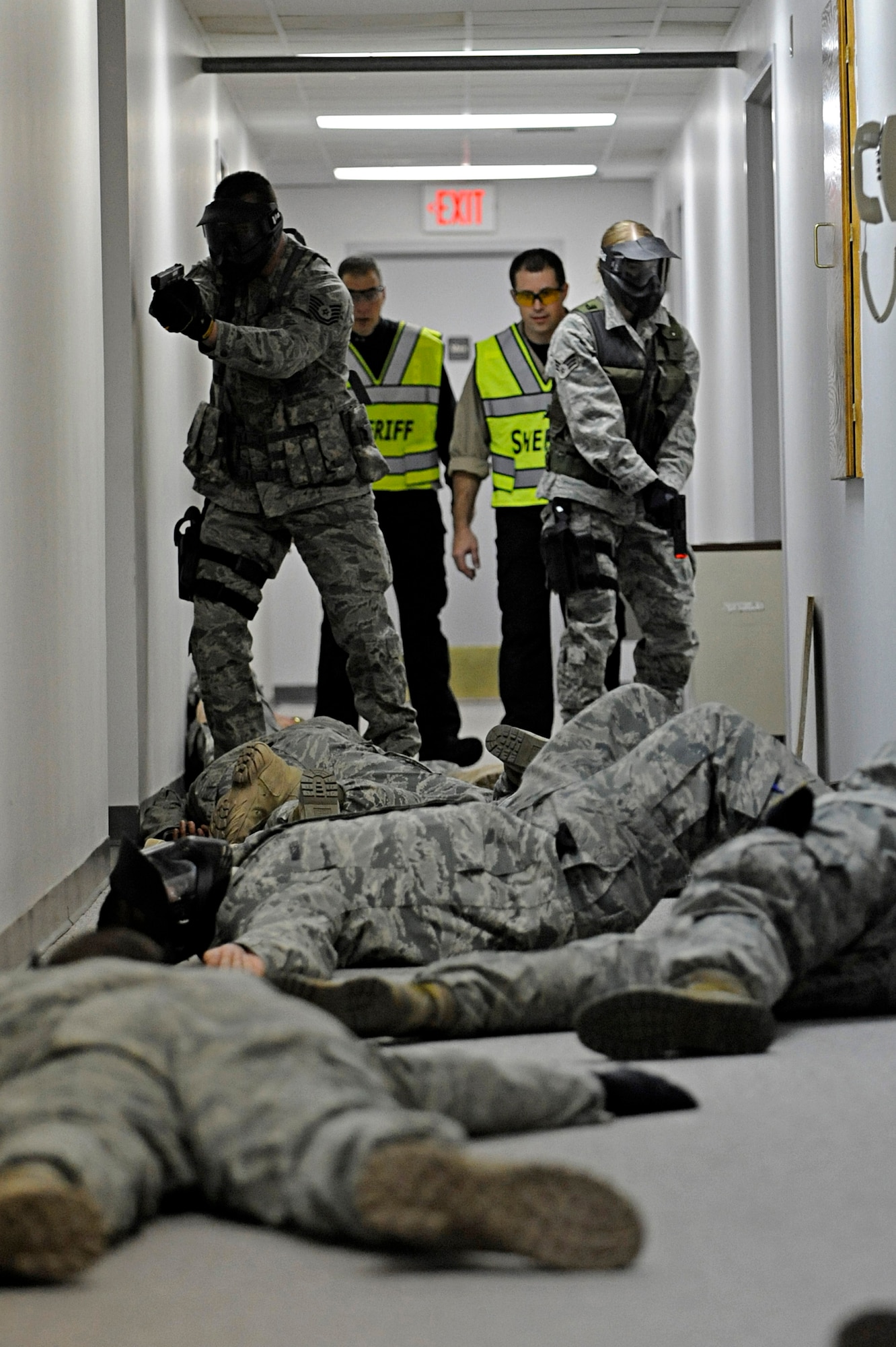 Members of the 28th Security Forces Squadron participate in an armed threat training exercise Jan. 25, 2010, at Ellsworth Air Force Base, S.D. The training was designed to help Airmen understand and develop tactics against various scenarios. (U.S. Air Force photo/Airman 1st Class Matthew Flynn)