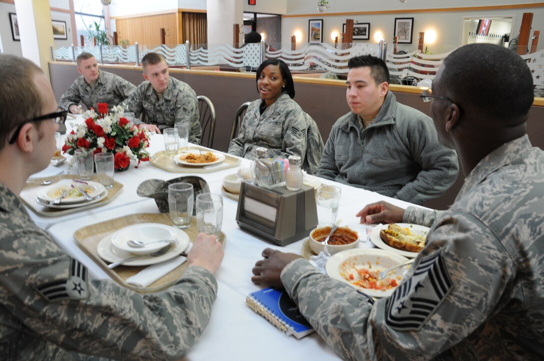 Airmen meet with Chief Master Sgt. James Davis, 316th Wing/Joint Base Andrews command chief, for an Airman’s Luncheon at Freedom Hall Dining Facility on Joint Base Andrews, Md., Feb. 2, 2010. During the luncheon, Chief Davis engaged the Airman about their opinions on leadership, base programs and any concerns they had. Col. Steven Shepro, 316 WG/Joint Base Andrews commander, and Chief Davis hold the luncheon regularly to “get a snapshot” of what is happening on Joint Base Andrews from a junior-enlisted perspective. (US Air Force photo/Chelsea Gitzen)