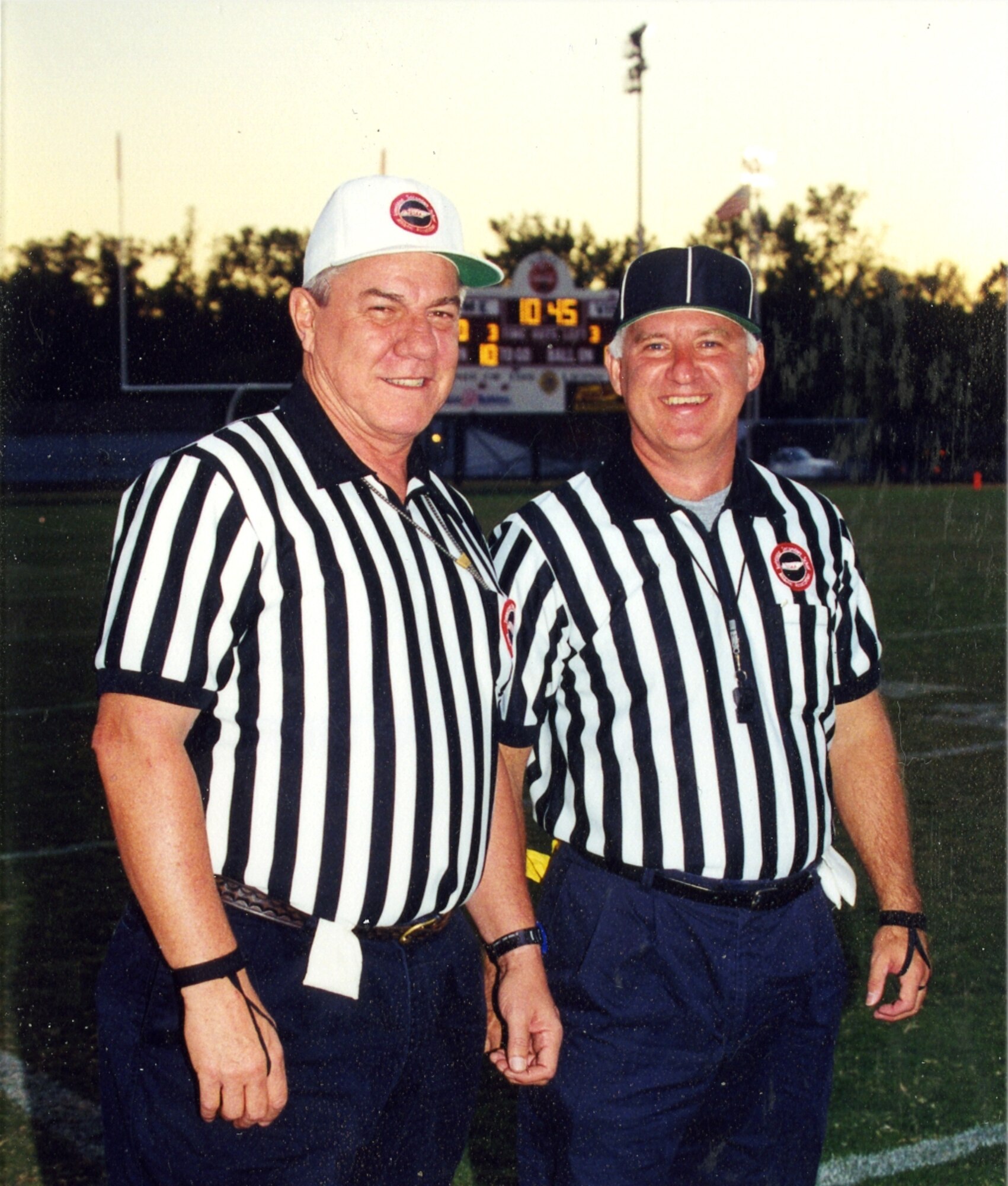 Jack Lamons, left, and Mike McKenzie, a pharmacologist at the Murfreesboro VA Medical Center, pose for a picture before refereeing a game in 2004. (Photo provided)