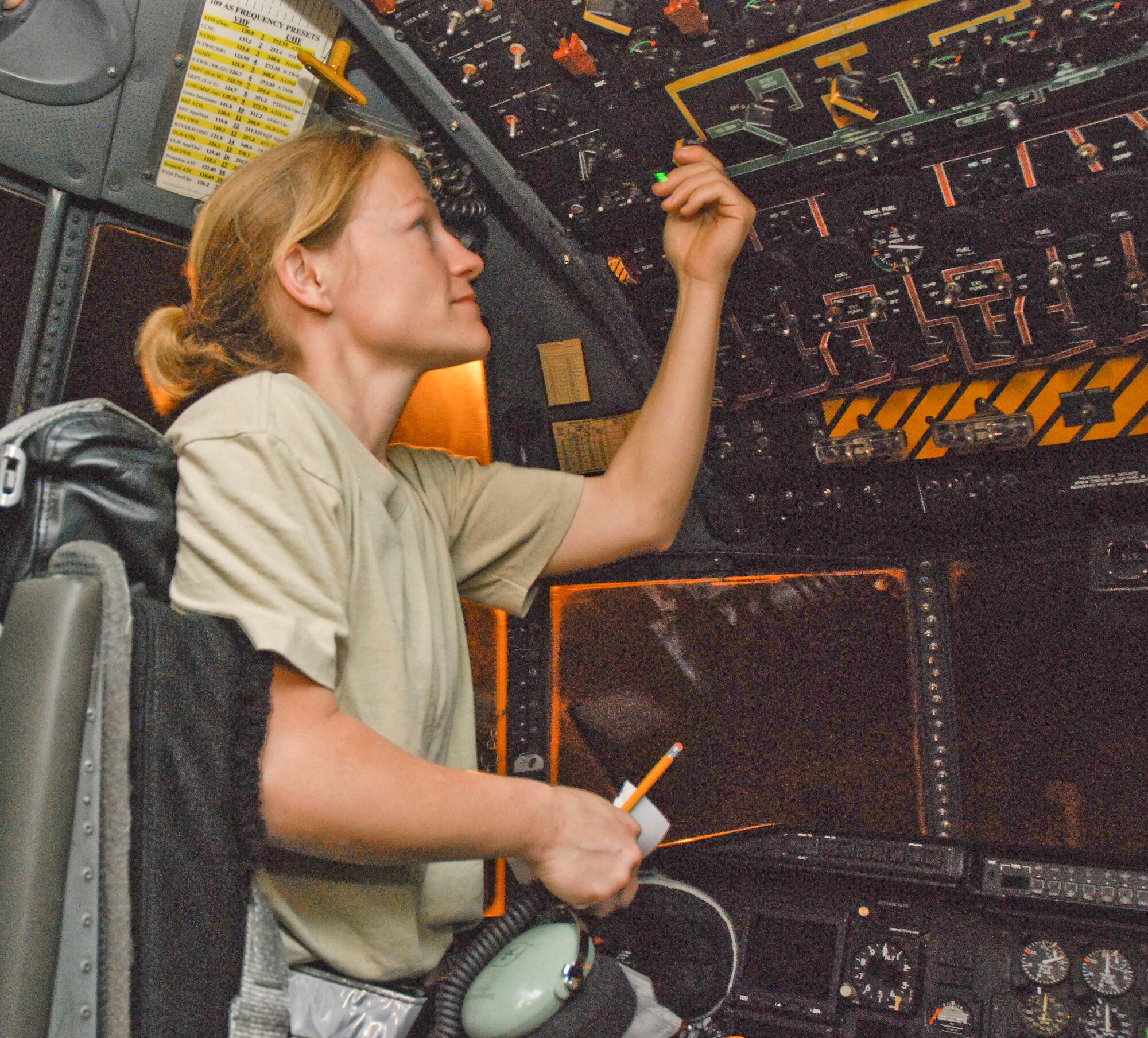 Staff Sgt. Brandilen Leary switches off power to a C-130 Hercules after completing the post-flight radar and navigation systems check Jan. 27, 2010, at Muniz Air Base, Puerto Rico. Sergeant Leary is a 35th Expeditionary Airlift Squadron communications/navigation technician from the 302nd Airlift Wing, Peterson Air Force Base, Colo. (U.S. Air Force photo/Master Sgt. Stan Coleman) 