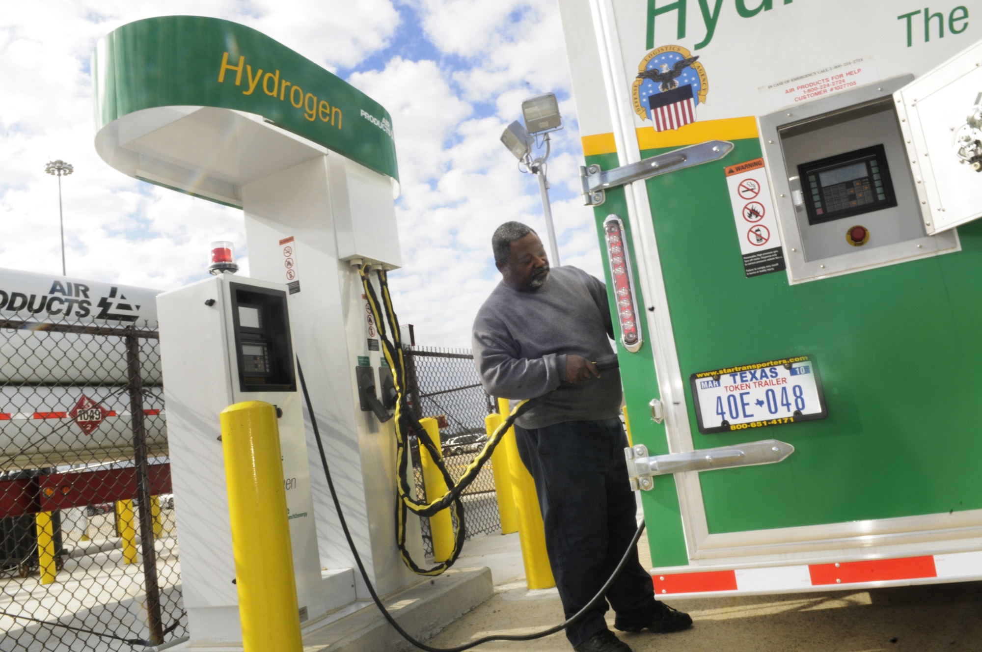 Bobby McIntosh, DDWG motor vehicle operator loads a mobile hydrogen refueling vehicle at the hydrogen plant Feb. 1. After fueling the mobile vehicle he will travel to the various locations on base to refuel the 20 forklifts in operation in DDWG. U. S. Air Force photo by Sue Sapp