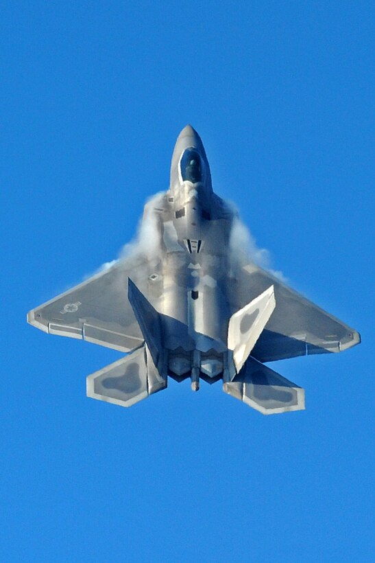 LANGLEY AIR FORCE BASE, Va. -- Maj. David "Zeke" Skalicky, F-22A Raptor Demonstration Team pilot, performs for Gen. William M. Fraser III, Air Combat Command commander, Feb. 3.  Although already “Commander Air Combat Command” certified, the F-22A Raptor Demonstration Team flew the last of the certification flights.  (U.S. Air Force photo/Senior Airman Zachary Wolf)