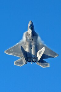 LANGLEY AIR FORCE BASE, Va. -- Maj. David "Zeke" Skalicky, F-22A Raptor Demonstration Team pilot, performs for Gen. William M. Fraser III, Air Combat Command commander, Feb. 3.  Although already “Commander Air Combat Command” certified, the F-22A Raptor Demonstration Team flew the last of the certification flights.  (U.S. Air Force photo/Senior Airman Zachary Wolf)