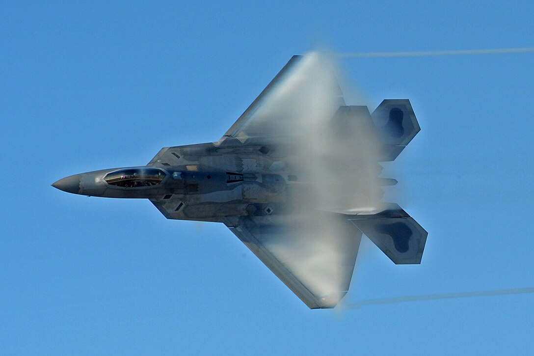 LANGLEY AIR FORCE BASE, Va. -- Maj. David "Zeke" Skalicky, F-22A Raptor Demonstration Team pilot, performs for Gen. William M. Fraser III, Air Combat Command commander, Feb. 3.  Although already “Commander Air Combat Command” certified, the F-22A Raptor Demonstration Team flew the last of the certification flights.  (U.S. Air Force photo/Senior Airman Zachary Wolf)

