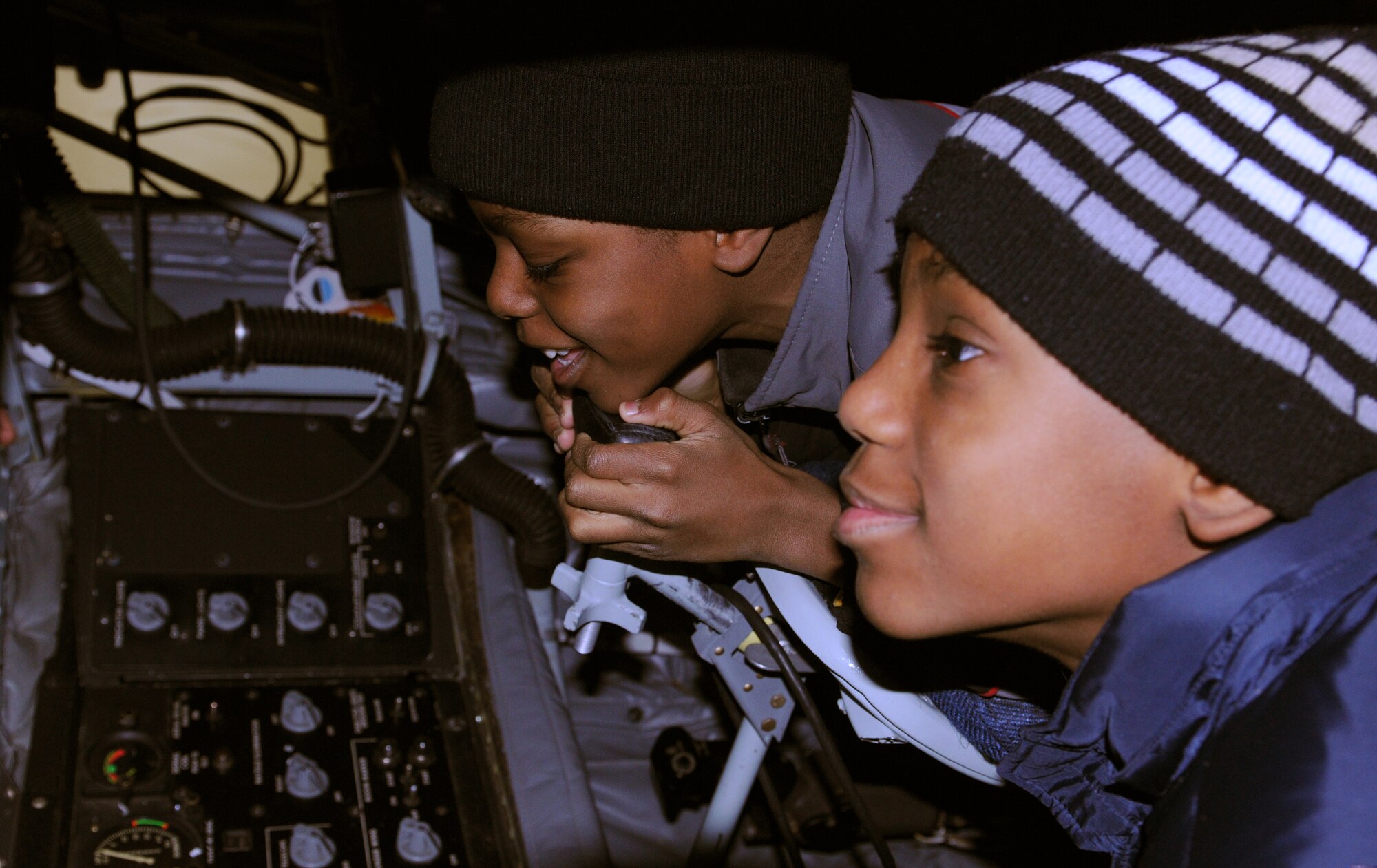 JOINT BASE ANDREWS, Md. -- Students from the Patriots of Technology Learning Center with FIRST Lego League Robotics enjoy a firsthand view of the boom pod of a KC-135R Stratotanker Jan. 9. The aircraft tour was part of an overall base visit the group had here during the January Unit Training Assembly. (U.S. Air Force photo/ Senior Airman Amber Russell Ford)