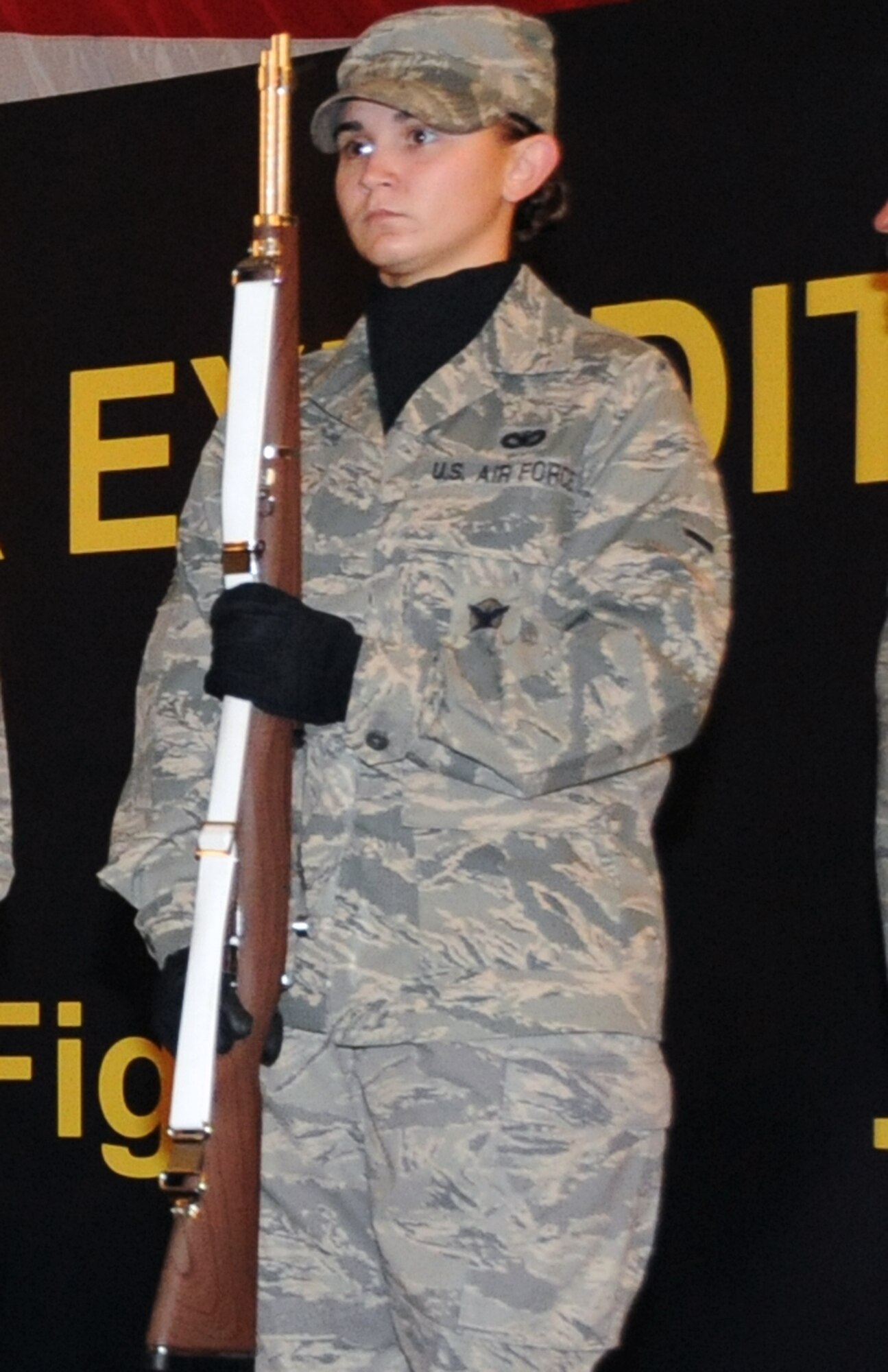 Airman Lyndee Bennett, security forces journeyman with the 380th Expeditionary Security Forces Squadron, participates as an honor guard member at a 380th Air Expeditionary Wing ceremony non-disclosed location in Southwest Asia.  Airman Bennett is deployed from the 95th Security Forces Squadron at Edwards Air Force Base, Calif., and her hometown is Wichita, Kan. (U.S. Air Force Photo/Master Sgt. Scott T. Sturkol/Released)