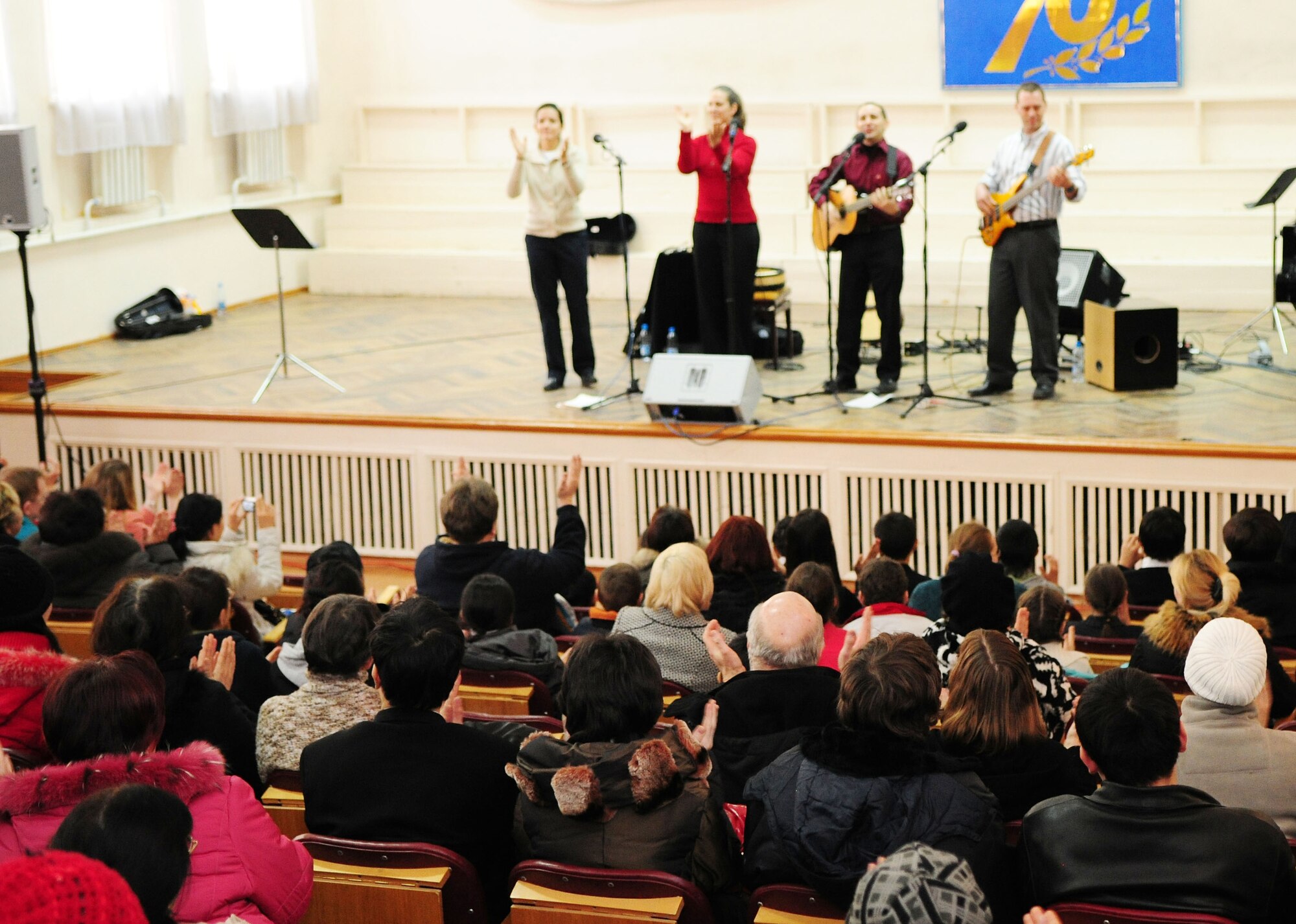 "Celtic Aire," the U.S. Air Forces Central Public Affairs band, performs for the parents, students and teachers at the Shubin Music School in Bishkek, Kyrgyzstan, Feb. 1, 2010. (U.S. Air Force photo/Senior Airman Nichelle Anderson/released)
