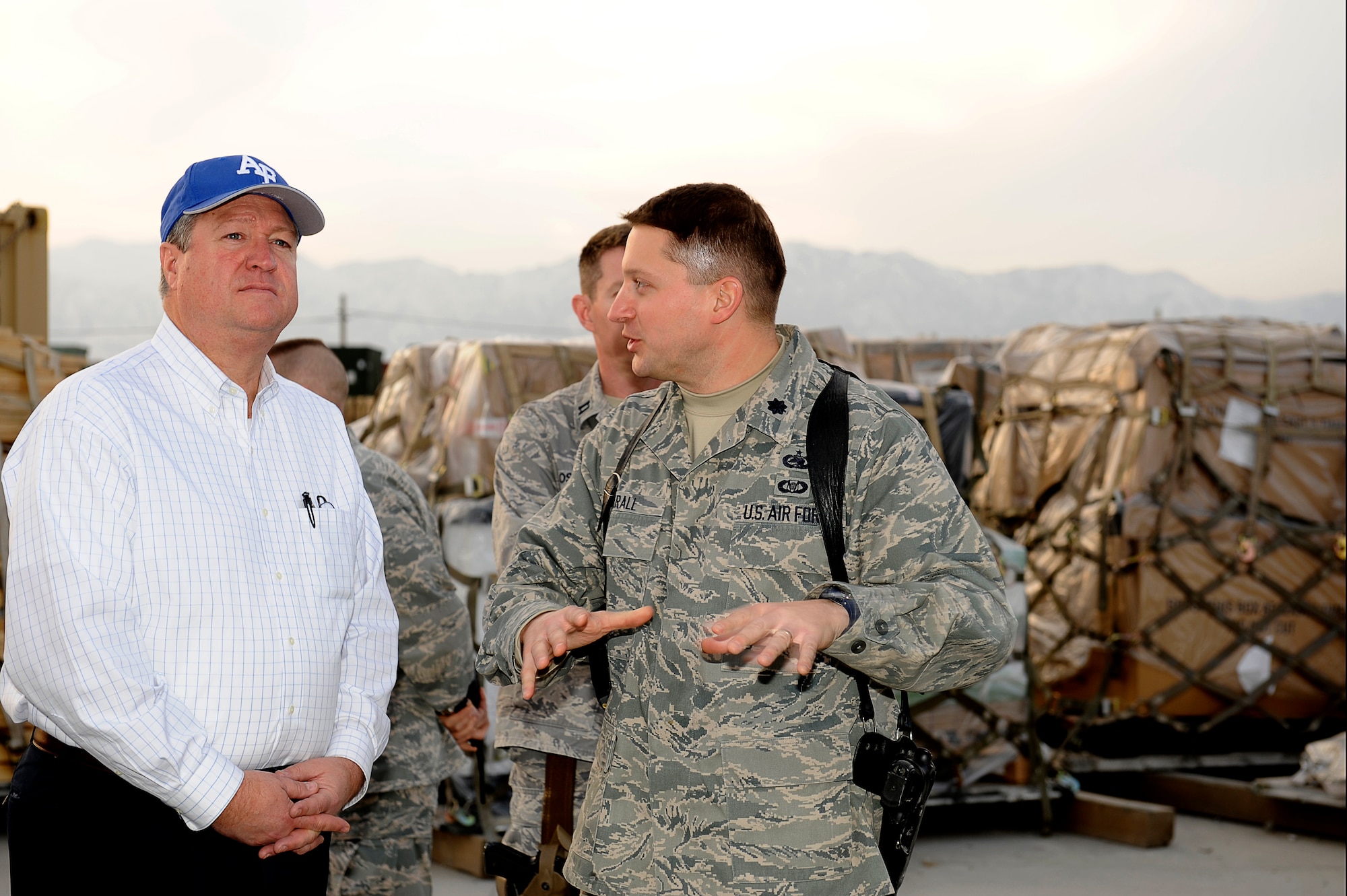 BAGRAM AIRFIELD, Afghanistan--Secretary of the Air Force Michael Donley is
briefed on aerial port operations by U.S. Air Force Lt. Col. Daniel Krall, commander, 455th Expeditionary Aerial Port Squadron on Bagram Airfield, Feb. 2, 2010. Secretary Donley was in Afghanistan to monitor the training efforts of the Afghanistan National Army Air Corps and to meet with Airmen. (U.S. Air Force photo by/ Tech. Sgt. Jeromy K. Cross)
