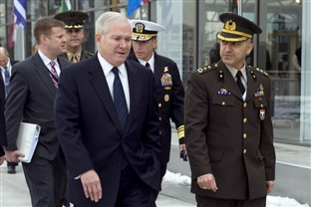 U.S. Defense Secretary Robert M. Gates walks with Turkish Lt. Col. Zafer Ali Ozsoy in Istanbul, Feb. 4, 2010.  Gates is in Turkey to conduct NATO bilateral meetings and to attend the Regional Command South meeting.  