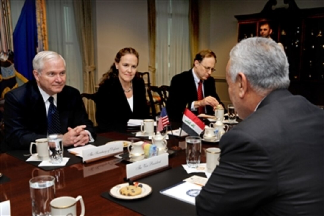 Secretary of Defense Robert M. Gates (left) hosts a meeting in the Pentagon with Iraqi Vice President Tariq al-Hashimi (right).  The Under Secretary of Defense for Policy Michele Flournoy (2nd from left) and Assistant Secretary of Defense for International Security Affairs Ambassador Alexander Vershbow also attended the meeting.  