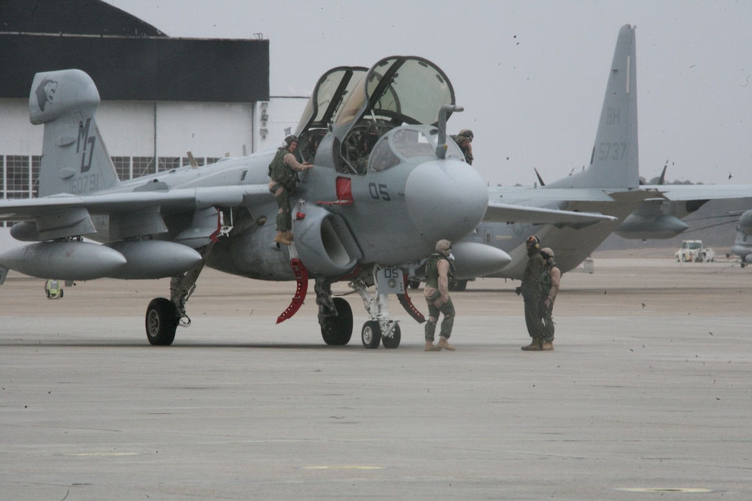 An aircrew with Marine Tactical Electronic Warfare Squadron 3 climbs out of its EA-6B Prowler after landing on the Cherry Point flight line, Feb. 5. Prowlers from VMAQ-3 participated in task force support missions. VMAQ-3’s Prowlers were the last Marine aircraft to leave Iraq in support of Operation Iraqi Freedom.