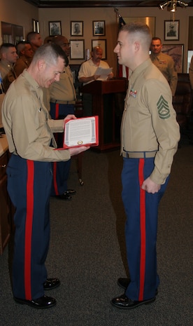 GySgt. Joshua Shaffer, SNCOIC or RSS Kokomo, is awarded the elusive title of Centurion after only 21 mos as a canvassing recruiter.  Shaffer enlisted 100 qualified young men and women, 80 percent in the upper mental groups and all them were Tier 1, High School Graduates.