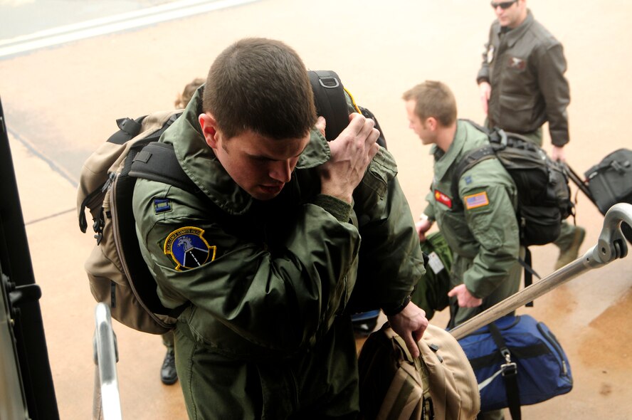 ALTUS AIR FORCE BASE, Okla. – Capt. Jake Fox, a student pilot from the 97th Training Squadron, boards a C-17 Globemaster III Feb  4. Pilots from Altus Air Force Base relocate to Kelly AFB to resume training due to the severe ice storm that swept through the area Jan. 28. (U.S. Air Force photo/Airman 1st Class Myles T. Stepp)