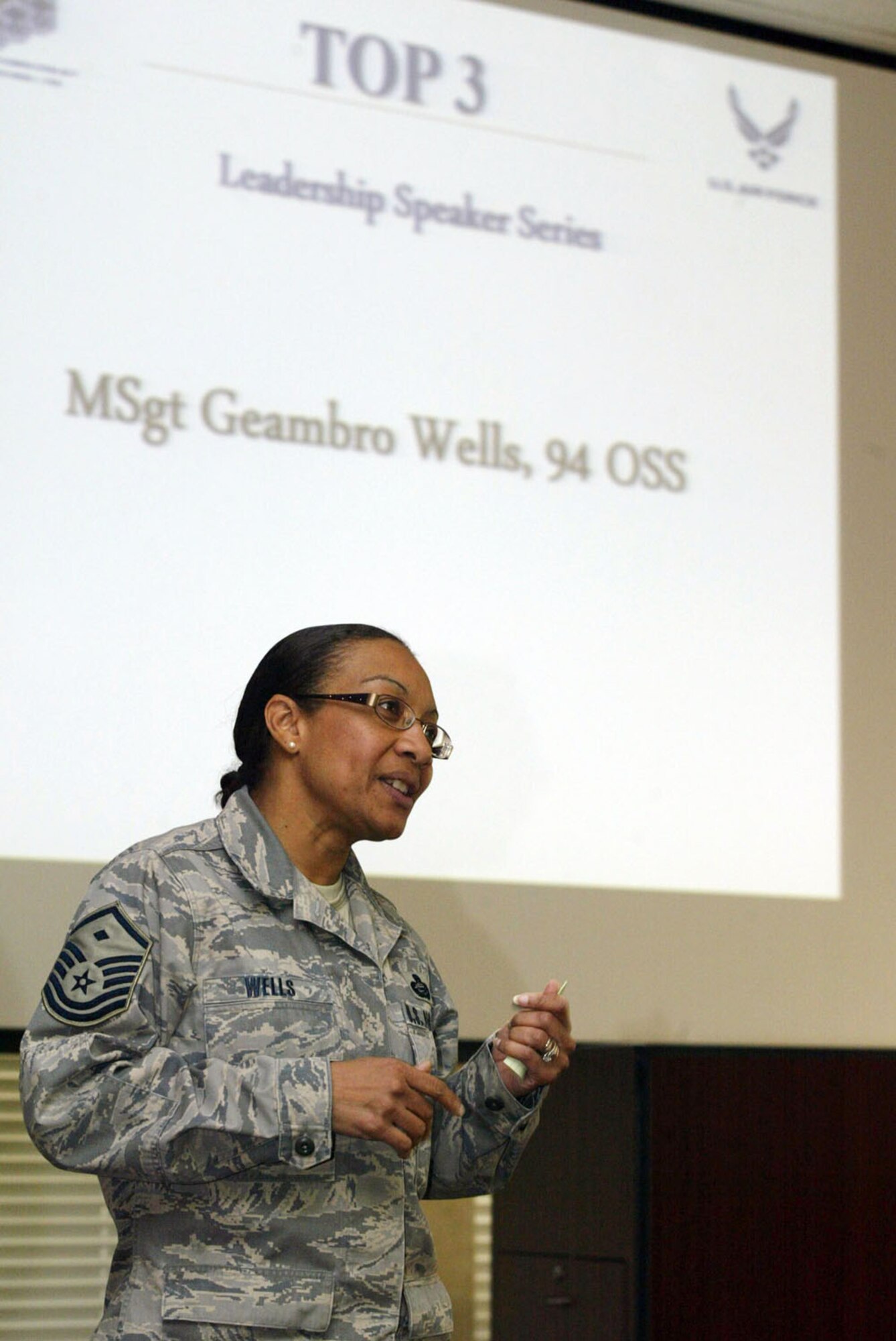 Master Sgt Geambro Wells, first sergeant, 94th Operations Support Squadron, briefs members of the Top 3 on some of her experiences while deployed to Afghanistan Jan 10. Sergeant Wells was the first speaker in the new "Leadership Speaker Series" program created by the group. (U.S. Air Force photo/Don Peek)