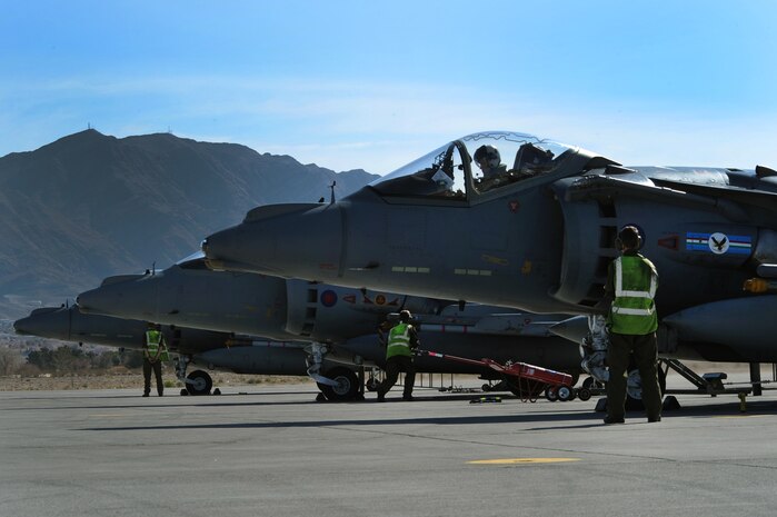 NELLIS AIR FORCE BASE, Nev. - Crew members assigned to Royal Air Force Cottesmore, United Kingdom, prepare the GR-9 Harrier for flight on the Nellis Air Force Base, Nev., flight line during Red Flag 10-2 Feb. 3, 2010.  Red Flag is a realistic combat training exercise involving the air forces of the United States and its allies. The exercise is conducted on the 15,000-square-mile Nevada Test and Training Range, north of Las Vegas. (U.S. Air Force photo by Lawrence Crespo/RELEASED)