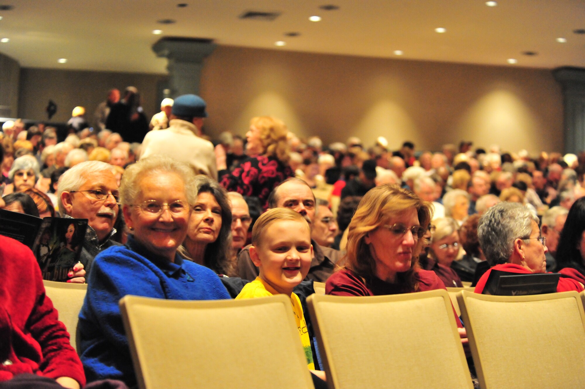 SUMTER, S.C. -- Sumter folks settle in for the Tops in Blue performance at the Patriot Hall auditorium Feb. 3. Tops in Blue, an ensemble made up of the most-talented Airmen in the force, entertains military and civilian audiences around the globe with music. Their tour encompasses more than 120 shows worldwide and includes numerous shows for deployed Airmen in the Southwest Asia area of operations. (U.S. Air Force photo/Airman 1st Class Amber E. N. Jacobs)