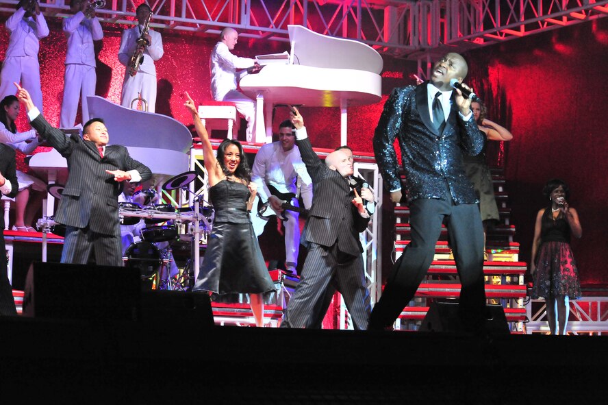 SUMTER, S.C. -- Tech. Sgt. Octavious Hill, a performer with Tops in Blue, sings during a performance for the Sumter community at the Patriot Hall Auditorium Feb. 3. Tops in Blue, an ensemble made up of the most-talented Airmen in the force, entertains military and civilian audiences around the globe with music. Their tour encompasses more than 120 shows worldwide and includes numerous shows for deployed Airmen in the Southwest Asia area of operations. (U.S. Air Force photo/Airman 1st Class Amber E. N. Jacobs)