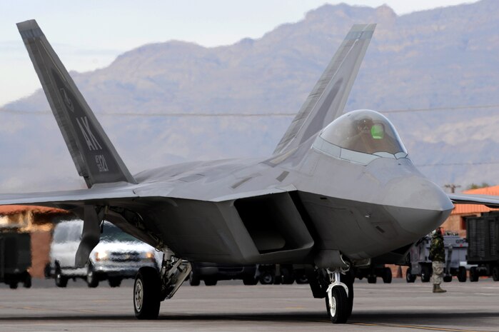 A F-22 Raptor assigned to the 525th Fighter Squadron, prepares to depart Nellis Air Force Base, Nev., flight line for a training mission during Red Flag 10-2 at Nellis Air Force Base, Nev., Feb. 4, 2010. Red Flag is a realistic combat training exercise involving the air forces of the United States and its allies. The exercise is conducted on the 15,000-square-mile Nevada Test and Training Range, north of Las Vegas.  (U.S. Air Force photo by Airman 1st Class Brett Clashman/RELEASED)