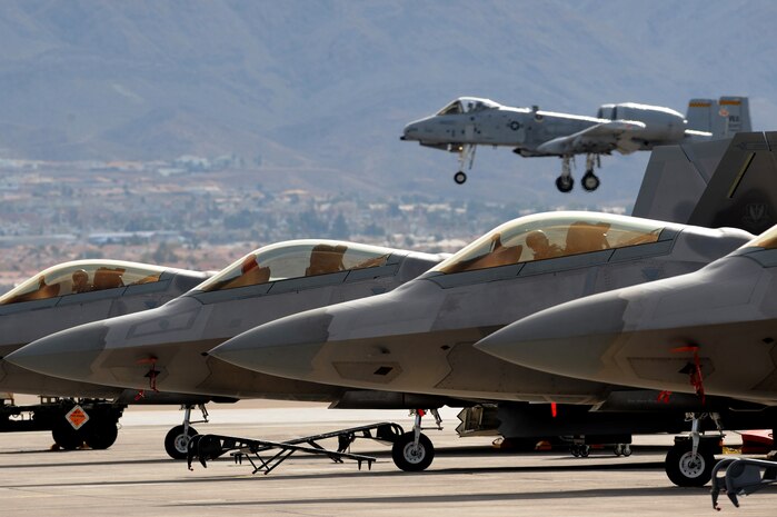 F-22A's assigned to the 525th Fighter Squadron, Elmendorf Air Force Base, Alaska, and the 49th Fighter Squadron, Holloman Air Force Base, N.M., prepare to depart Nellis Air Force Base, Nev., flight line for a training mission during Red Flag 10-2 at Nellis Air Force Base, Nev., Feb. 4, 2010. Red Flag is a realistic combat training exercise involving the air forces of the United States and its allies. The exercise is conducted on the 15,000-square-mile Nevada Test and Training Range, north of Las Vegas.(U.S. Air Force photo by Airman 1st Class Brett Clashman/RELEASED)