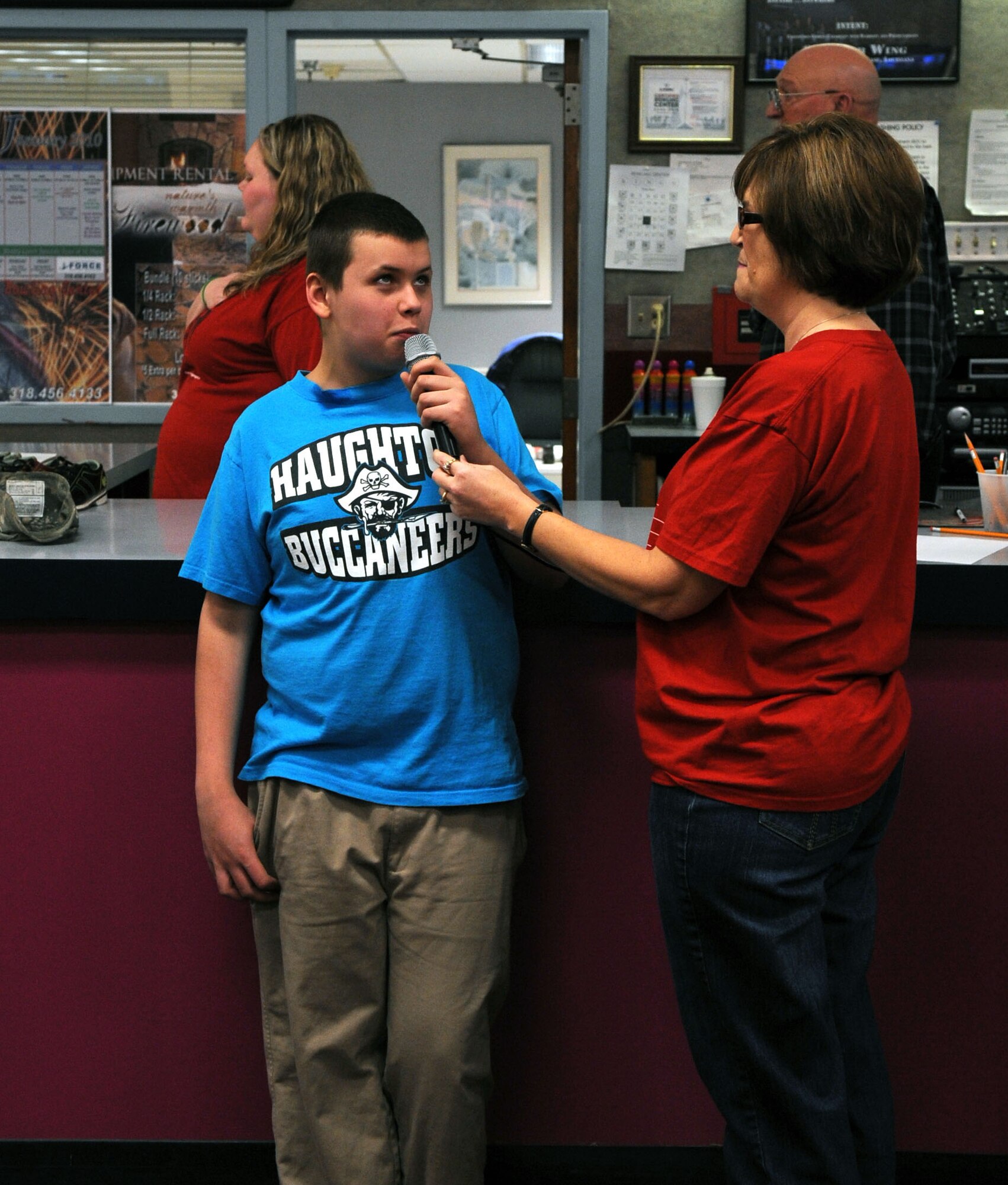 BARKSDALE AIR FORCE BASE, La. – Special Olympic athlete Joseph Moore recites the pledge of allegiance before the games began during Barksdale’s second annual bowling tournament Jan. 29. More than 70 volunteers and 150 special needs athletes showed up for the two-day event at the Barksdale 16-Lane Bowling Center. (U.S. Air Force photo by Senior Airman La’Shanette V. Garrett)(RELEASED)