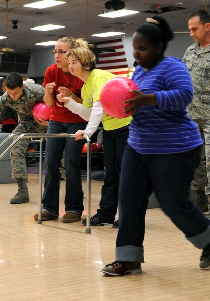 BARKSDALE AIR FORCE BASE, La. – Special Olympics athletes and volunteers bowl and observe during Barksdale’s second annual bowling tournament Jan. 29. More than 70 volunteers and 150 special needs athletes showed up for the two-day event at the Barksdale 16-Lane Bowling Center. (U.S. Air Force photo by Senior Airman La’Shanette V. Garrett)(RELEASED)