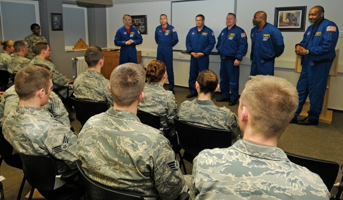 SPANGDAHLEM AIR BASE, Germany – Astronauts from the STS-129 mission speak with students of Spangdahlem’s Airman Leadership School and First Term Airman Center during their visit to Spangdahlem Air Base Feb. 3. The crew recently ventured into space aboard the space shuttle Atlantis on an 11-day mission to deliver parts and make repairs to the international space station and conducted three space walks. (U.S. Air Force photo/Senior Airman Benjamin Wilson)