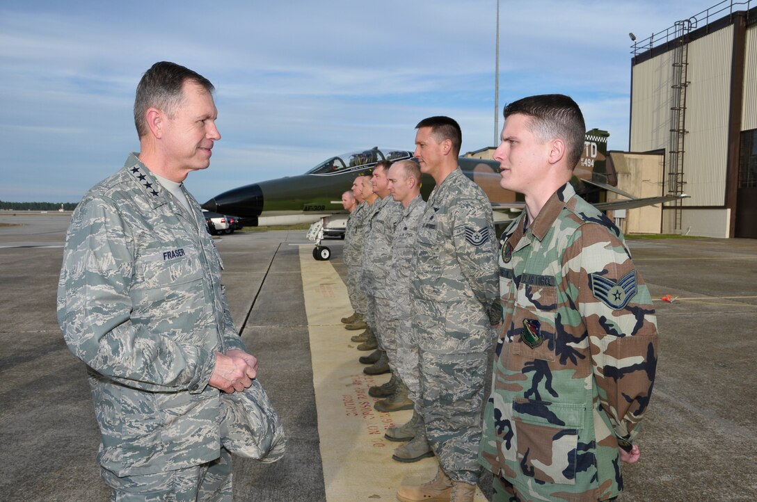 Gen. William M. Fraser III meets Staff Sgt. Joseph E. Johnston and several other NCOs during a visit Jan. 28, 2010, to Tyndall Air Force Base, Fla. General Fraser is the commander of Air Combat Command. Sergeant Johnston is from the 53rd Test Support Squadron. (U.S. Air Force photo/Lisa Norman)