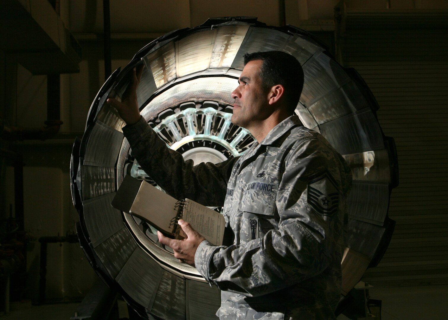 Senior Master Sgt. David Pantojas, Inter-American Air Forces Academy, performs validation checks Jan. 25 to ensure aircraft systems are ready for the upcoming maintenance training courses taught at IAAFA. Instructors at IAAFA provide training to 21 Latin American nations on 20 different aircraft maintenance related courses. (U.S. Air Force photo/Robbin Cresswell)
