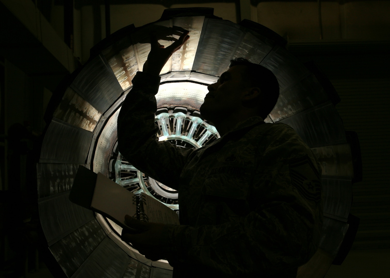 Senior Master Sgt. David Pantojas, Inter-American Air Forces Academy, performs validation checks Jan. 25 to ensure aircraft systems are ready for the upcoming maintenance training courses taught at IAAFA. Instructors at IAAFA provide training to 21 Latin American nations on 20 different aircraft maintenance related courses. (U.S. Air Force photo/Robbin Cresswell)