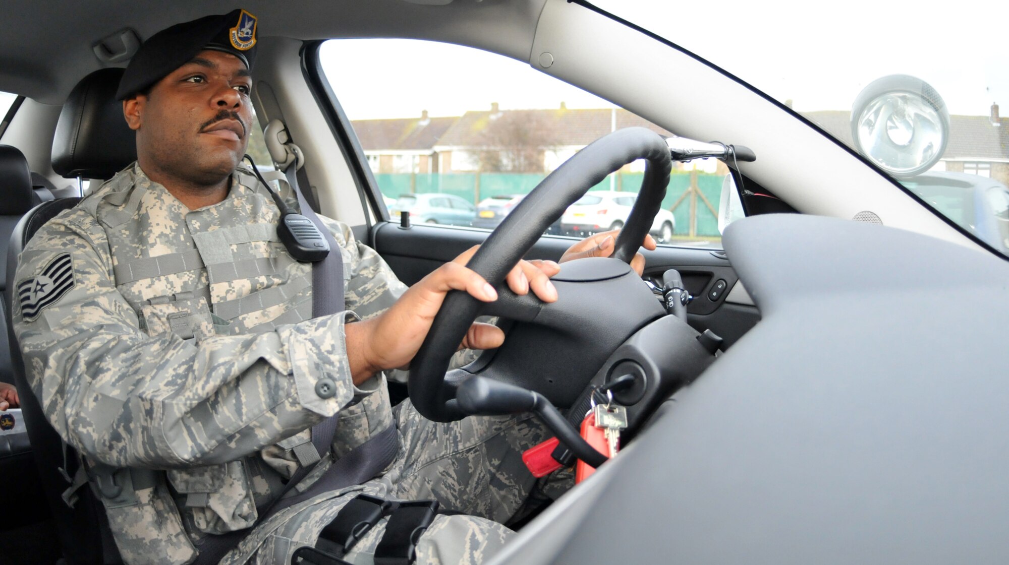 RAF MILDENHALL, England -- Tech Sgt. Tavarus Melton, 100th Security Forces Squadron, patrols the base Feb. 5.  As a flight chief, the 12-year security forces veteran periodically stops in on Defenders posted at various locations around RAF Mildenhall, receiving post reports and making sure things are running smoothly.  (U.S Air Force photo by Staff Sgt. Austin M. May)
