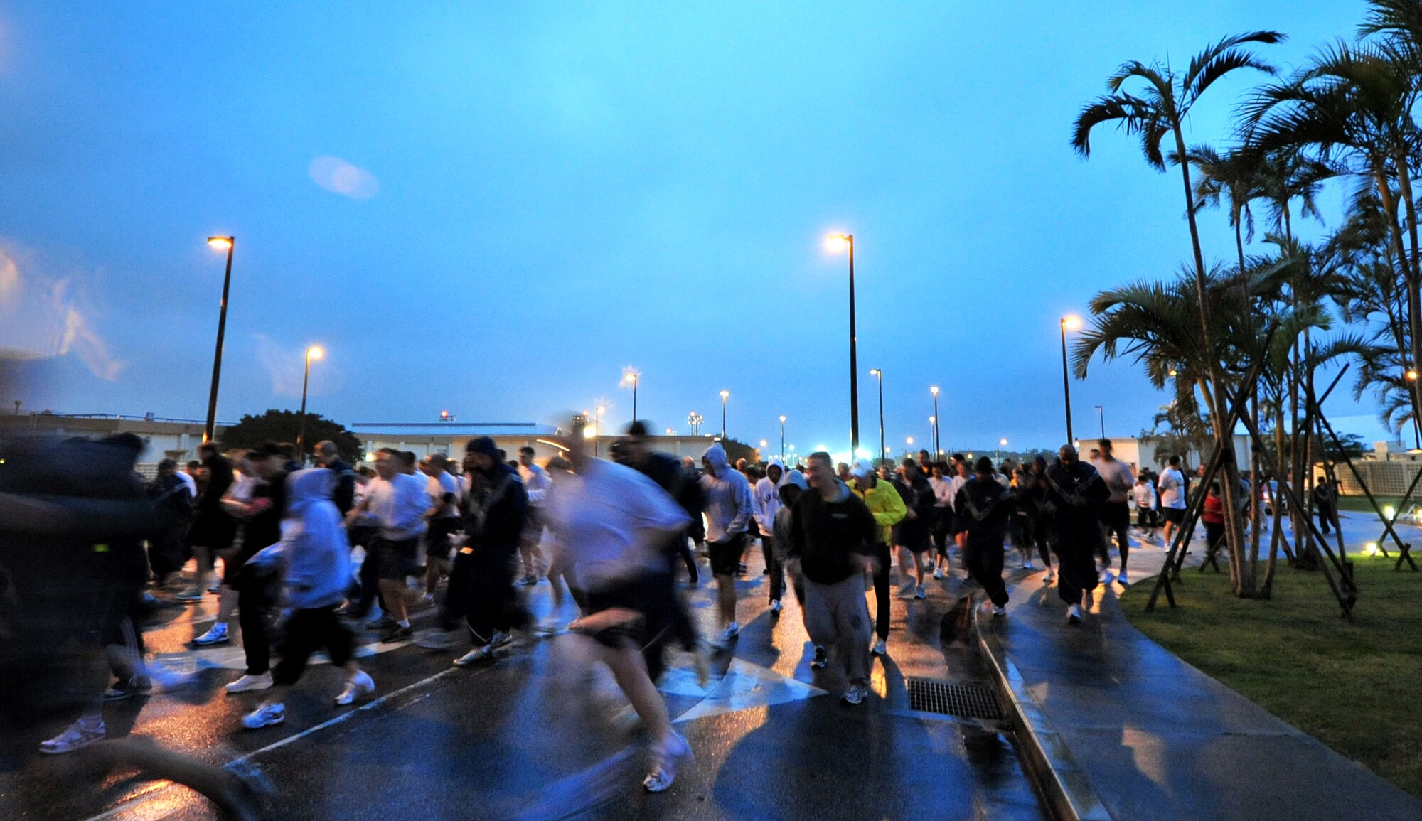 Military members and their families participated in a 5K run hosted by the Top3 to raise money for the Haitian relief fund Feb. 5, 2010. The event raised $8K and will be collected with other fundraisers and presented to the American Red Cross here.
(U.S. Air Force photo/Tech. Sgt. Rey Ramon)   