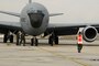 Members of the 151st Maintenance Group prepare a KC-135 for landing in full MOPP gear during an Ability to Survive and Operate exercise on February 6 at the Utah Air National Guard Base.  The 151st Maintenance and Operations Groups are training for an upcoming Operational Readiness Exercise.  U.S. Air Force Photo by: Staff Sgt. Emily Monson (RELEASED)