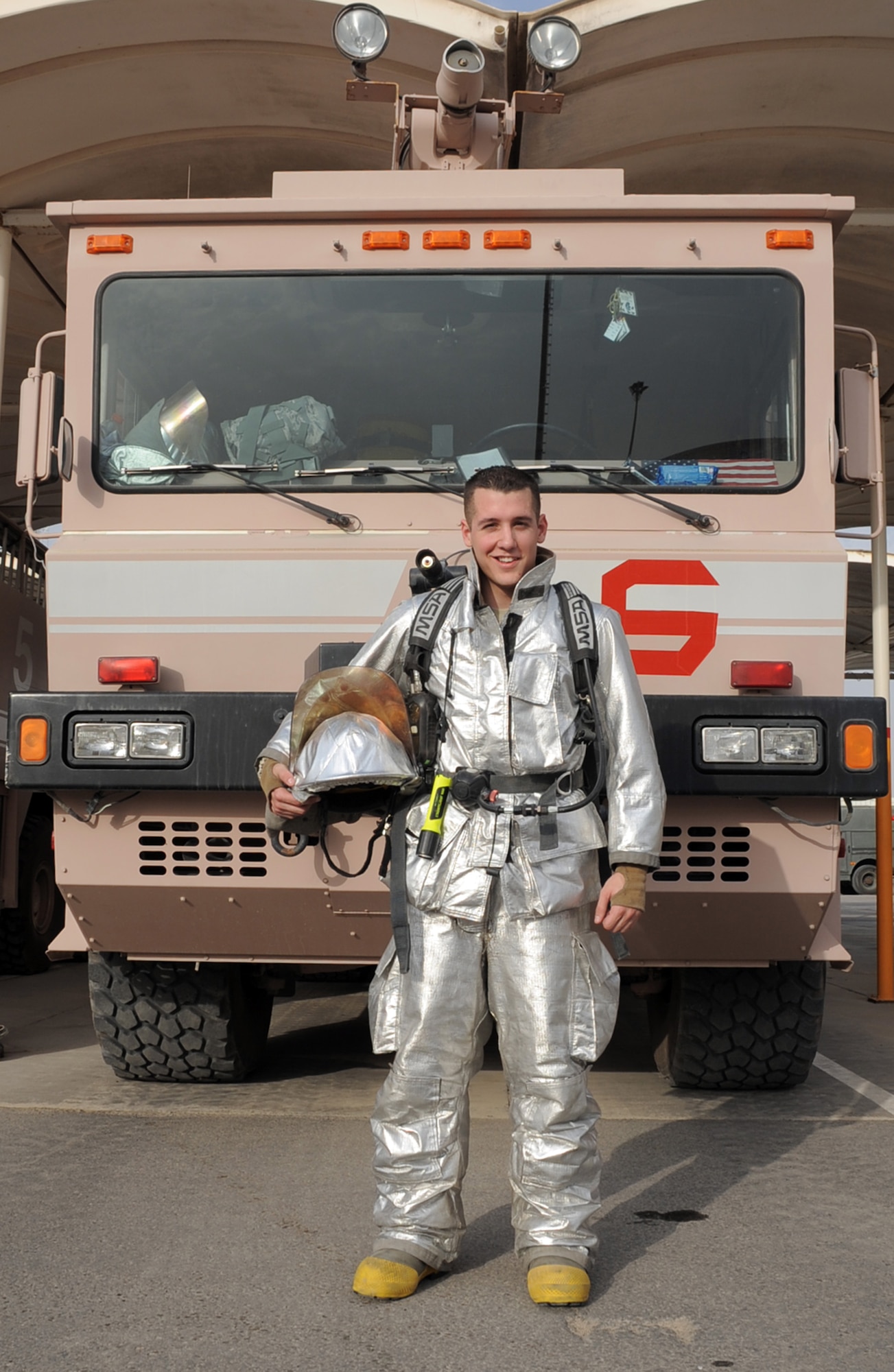Airman 1st Class Brandon Ramos is an Air Force firefighter with the 380th Expeditionary Civil Engineer Squadron fire department at a non-disclosed base in Southwest Asia. He is deployed from the 100th CES fire department at RAF Mildenhall, England. As an emergency responder, Airman Ramos and his fellow firefighters are responsible for protecting millions of dollars of Air Force assets and personnel from fire. His hometown is Junction City, Kan. (U.S. Air Force Photo/Master Sgt. Scott T. Sturkol/Released)
