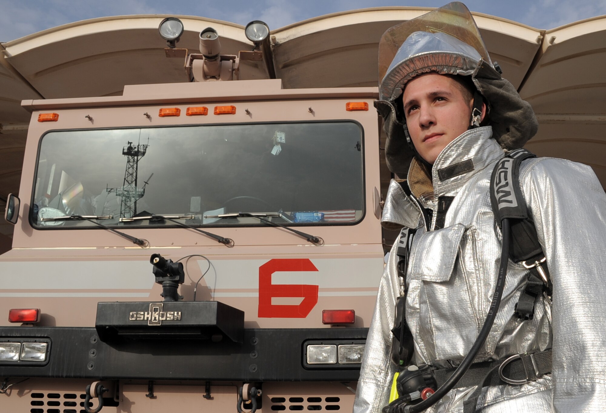 Airman 1st Class Brandon Ramos is an Air Force firefighter with the 380th Expeditionary Civil Engineer Squadron fire department at a non-disclosed base in Southwest Asia. He is deployed from the 100th CES fire department at RAF Mildenhall, England. As an emergency responder, Airman Ramos and his fellow firefighters are responsible for protecting millions of dollars of Air Force assets and personnel from fire. His hometown is Junction City, Kan. (U.S. Air Force Photo/Master Sgt. Scott T. Sturkol/Released)