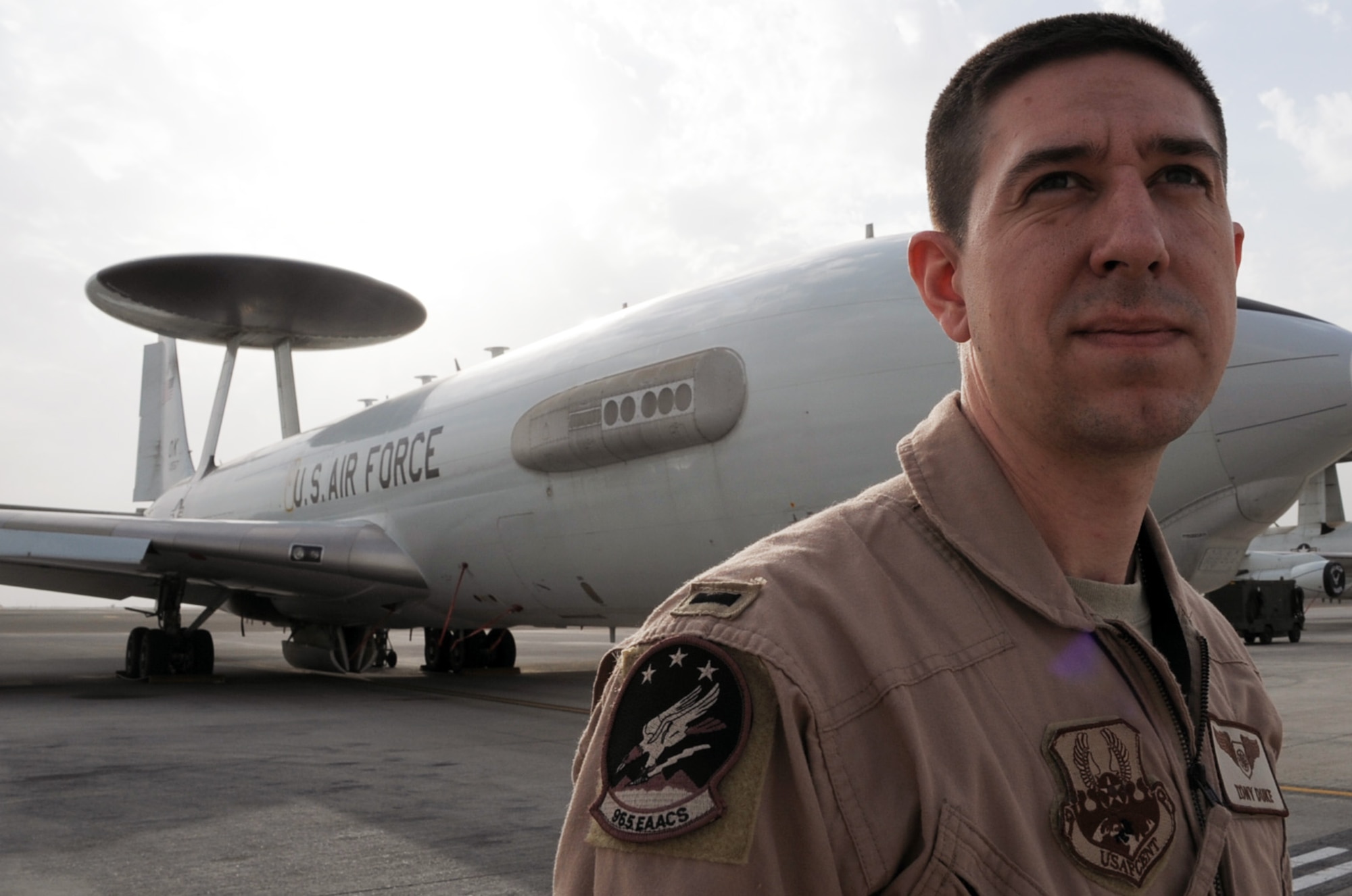 First Lt. Tony Duke is an E-3 Sentry Airborne Warning and Control System aircraft air weapons officer with the 965th Expeditionary Airborne Air Control Squadron deployed to a non-disclosed base in Southwest Asia.  As an air weapons officer, he provides airspace battle management over places like Afghanistan to execute tactical control and employment of all assigned aircraft operating in that area. Lieutenant Duke is deployed from the 965th AACS at Tinker Air Force Base, Okla., and his hometown is Lubbock, Texas. (U.S. Air Force Photo/Master Sgt. Scott T. Sturkol/Released)