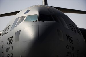 A C-17 Globemaster III aircrew assigned to the 816th Expeditionary Airlift Squadron, prepares for a combat-airdrop over Afghanistan, Feb. 1, 2010, at a base in Southwest Asia. The maximum payload capacity of a C-17 is 170,900 pounds and its maximum takeoff weight is 585,000 pounds. (U.S. Air Force photo/Staff Sgt. Manuel J. Martinez/released)
