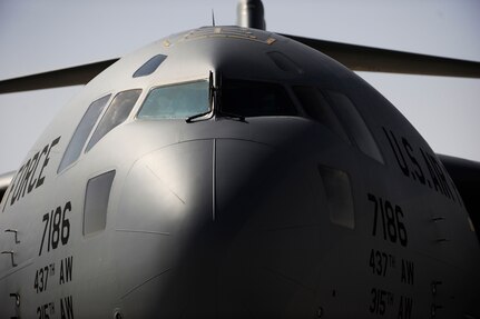 A C-17 Globemaster III aircrew assigned to the 816th Expeditionary Airlift Squadron, prepares for a combat-airdrop over Afghanistan, Feb. 1, 2010, at a base in Southwest Asia. The maximum payload capacity of a C-17 is 170,900 pounds and its maximum takeoff weight is 585,000 pounds. (U.S. Air Force photo/Staff Sgt. Manuel J. Martinez/released)
