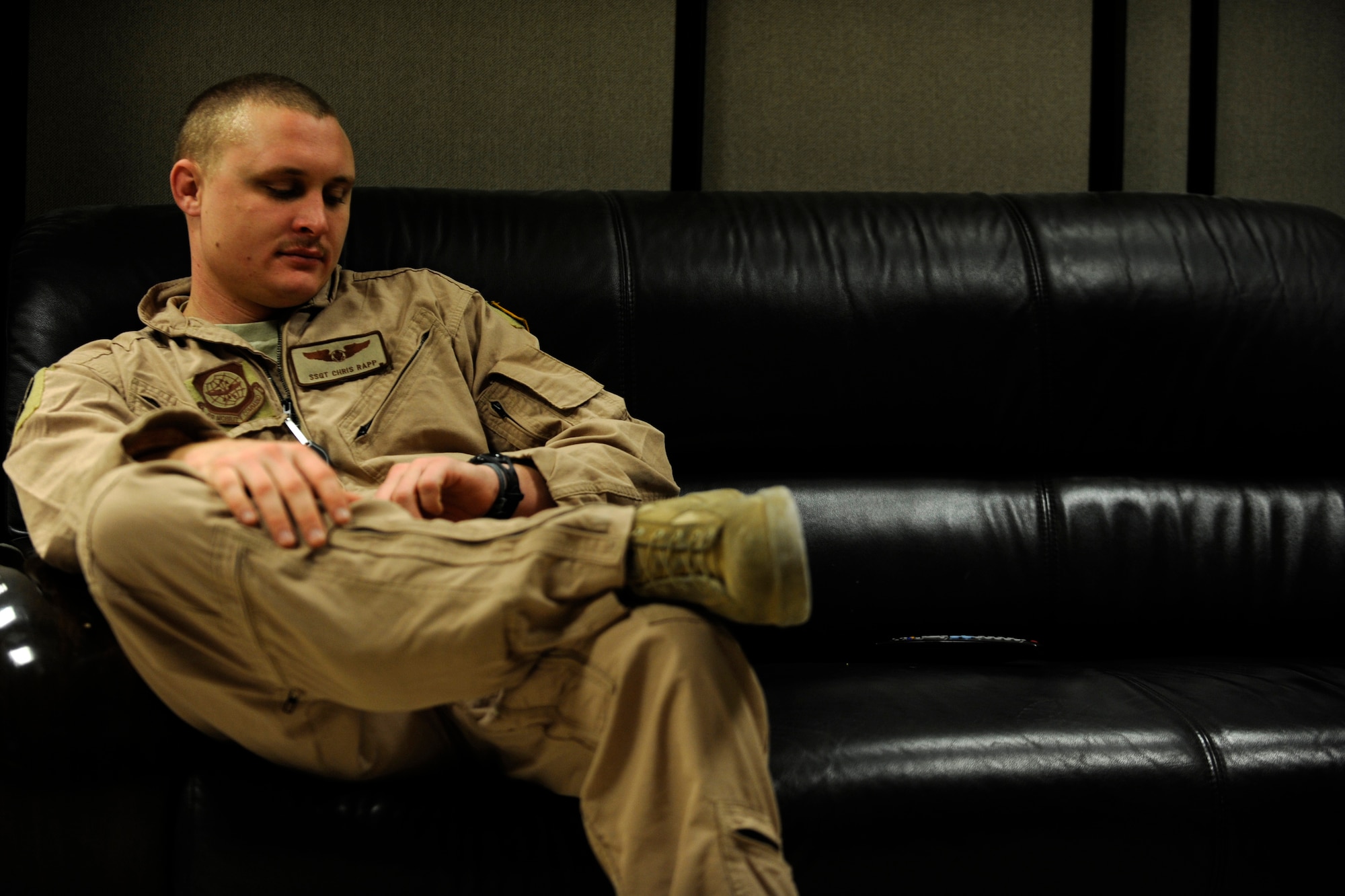 Staff Sgt. Chris Rapp, a C-17 Globemaster III loadmaster assigned to the 816th Expeditionary Airlift Squadron, waits to be transported to a C-17 for a mission to Afghanistan, Feb. 1, 2010. Sergeant Rapp and his co-workers are deployed from Charleston Air Force Base, S.C., and deployed to Southwest Asia.  (U.S. Air Force photo/Staff Sgt. Manuel J. Martinez/released)

