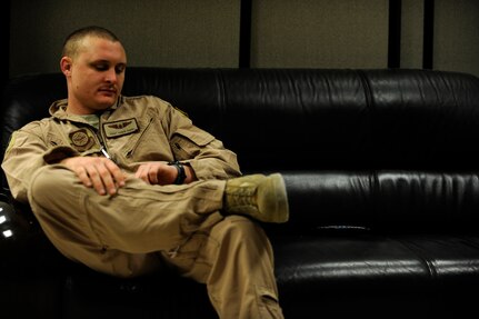Staff Sgt. Chris Rapp, a C-17 Globemaster III loadmaster assigned to the 816th Expeditionary Airlift Squadron, waits to be transported to a C-17 for a mission to Afghanistan, Feb. 1, 2010. Sergeant Rapp and his co-workers are deployed from Charleston Air Force Base, S.C., and deployed to Southwest Asia.  (U.S. Air Force photo/Staff Sgt. Manuel J. Martinez/released)

