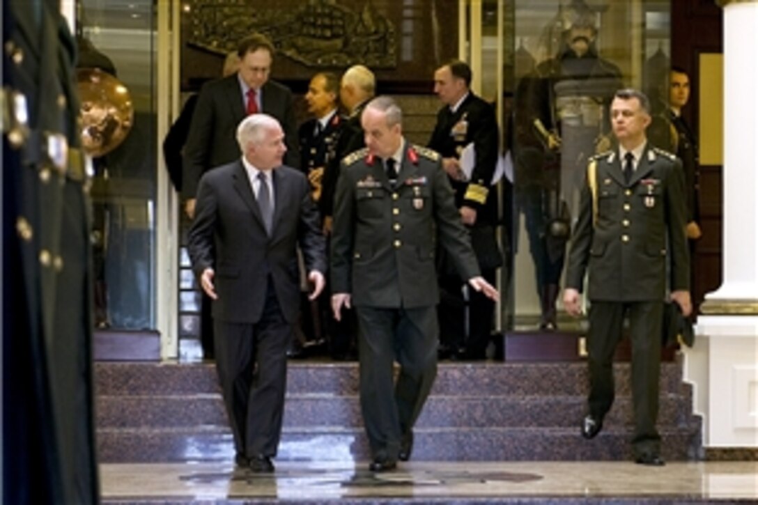 U.S. Defense Secretary Robert M. Gates walks with Turkish Chief of General Staff Gen. Ilker Basbug after their meeting in Ankara, Turkey, Feb. 6, 2010.  