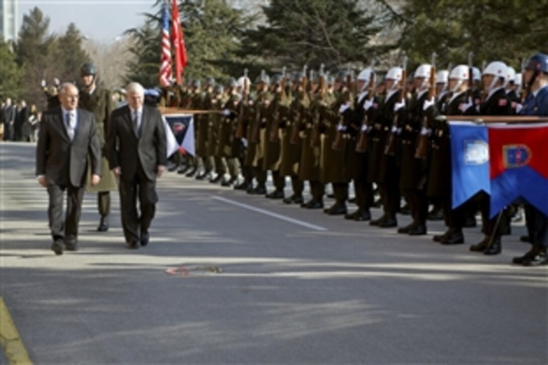U.S. Defense Secretary Robert M. Gates and Turkish Defense Minister Vecdi Gonul review the troops during an arrival ceremony at the Ministry of Defense in Ankara, Turkey, Feb. 6, 2010
